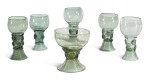 A GROUP OF SIX DUTCH OR GERMAN GREEN-TINTED GLASS SMALL ROEMERS | SECOND-HALF 17TH/18TH CENTURY