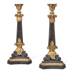 A PAIR OF FRENCH LOUIS-PHILIPPE GILT AND PATINATED BRONZE CANDLESTICKS, CIRCA 1840
