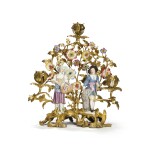 A GILT BRONZE-MOUNTED CANDELABRUM WITH CONTINENTAL PORCELAIN FIGURES, MID-18TH CENTURY, THE FIGURES PROBABLY VIENNA, CIRCA 1765