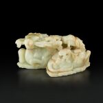 A large pale celadon and russet jade 'deer and lingzhi' group, Qing dynasty, 18th century |  清十八世紀 青白玉靈芝雙鹿