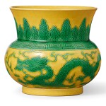 A FINE YELLOW-GROUND AND GREEN-GLAZED 'DRAGON AND PHOENIX' ZHADOU SEAL MARK AND PERIOD OF JIAQING | 清嘉慶 黃地綠彩雲龍紋渣斗  《大清嘉慶年製》款