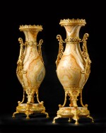 A pair of Napoleon III neo-grec gilt-bronze mounted onyx vases, circa 1870, attributed to Ferdinand Barbedienne