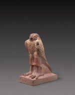 A Fragmentary Egyptian Red Granite Figure of the Horus Falcon, Ptolemaic Period, 305-30 B.C.