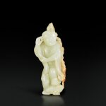 A white and russet jade 'Liu Hai and toad' group, Qing dynasty, 18th century |  清十八世紀 白玉劉海戲蟾