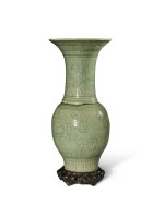 A carved 'Longquan' celadon-glazed 'peony' vase, Late Ming dynasty | 明末 龍泉窰青釉刻牡丹紋鳳尾尊