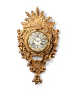 An early Louis XV carved and giltwood cartel clock