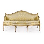 A George III white-painted and parcel-gilt settee, attributed to François Hervé after a design by James Wyatt, circa 1780