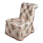 A PINK UPHOLSTERED SLIPPER CHAIR