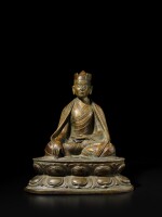 A large copper and silver-inlaid copper alloy figure of the First Karmapa Lama, Tibet, 14th / 15th century