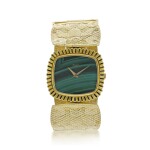 PIAGET | REFERENCE 9431 B72 A YELLOW GOLD CUSHION SHAPED BRACELET WATCH WITH MALACHITE DIAL, CIRCA 1971