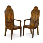A pair of late Regency oak and pollarded oak Gothic Revival armchairs, second quarter 19th century, possibly Scottish