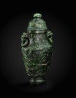 A large spinach-green jade 'Lotus' vase Qing dynasty, 19th century | 清十九世紀 碧玉荷塘鴛鴦雙羊活環耳蓋瓶