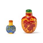 A red overlay imitation-realgar glass 'peach and gourd' snuff bottle, Qing dynasty, 18th / 19th century | 清十八 / 十九世紀 仿雄黃地套紅料福壽萬代紋鼻烟壺