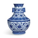 A rare blue and white 'floral' vase, hu Seal mark and period of Qianlong | 清乾隆 青花纏枝花卉海水紋折肩貫耳壺 《大清乾隆年製》款