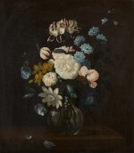 Still life with roses, honeysuckle, passion flower, daffodils and other flowers in a glass vase on a ledge