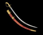 An important gilt-mounted sword with ruby eyes and matching scabbard from Tipu Sultan's armoury, India, Seringapatam, circa 1782-99
