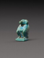 An Egyptian Turquoise Faience Figure of a Baboon, 12th/13th Dynasty, 1938-1640 B.C.