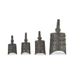 A set of four archaic bronze ritual 'dragon' bells Warring States period 戰國　青銅龍紋甬鐘一組四件