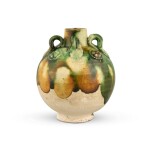 A miniature sancai-glazed pottery jar, Tang dynasty | 唐 三彩貼花四繫小罐