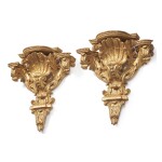A PAIR OF FRENCH RÉGENCE STYLE GILTWOOD BRACKETS