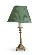 A modern brass candlestick lamp