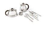 Monaco flatware service including 12 forks, 12 knives and 6 soup spoons ; a teapot and a coffee pot.