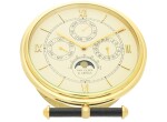 VAN CLEEF & ARPELS | LA COLLECTION  A GILT BRASS TRIPLE CALENDAR DESK TIMEPIECE WITH MOON PHASES, CIRCA 1980
