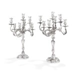 A pair of silver Louis XV style 7-light candelabra, Paris, modern | Paire de chandeliers à 7 lumières de style Louis XV en argent, Paris, moderne