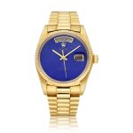 Reference 18038 Day-Date | A yellow gold automatic wristwatch with day, date, bracelet and lapis lazuli dial, Circa 1985