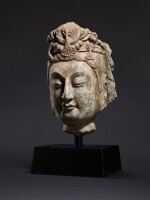A carved stone head of a bodhisattva Sui dynasty | 隋 石雕觀世音菩薩頭像