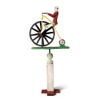 POLYCHROME PAINTED WOOD WHIRLIGIG OF A MAN RIDING HIGH WHEELER BICYCLE, CIRCA 1920