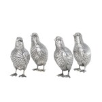 A set of four German silver bird condiment shakers, Neresheimer, Hanau, also with London import marks for 1921