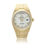 Reference 19018 Oysterquartz Day-Date  A yellow gold wristwatch with day, date and bracelet, Circa 1980