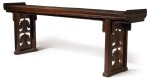 A LARGE LACQUERED-WOOD ALTAR TABLE QING DYNASTY, LATE 18TH CENTURY | 清十八世紀晚期 漆木如意紋翹頭案