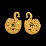A pair of gold repoussé 'Makara' earrings set with green glass beads Pre-Khmer, 8th century |  八世紀 前高棉時期 摩羯紋金耳飾一對