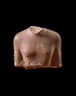 An Egyptian Peridotite Torso of a Man, Ptolemaic Period, 305-30 B.C.