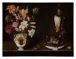 Still life with heraldic vase of flowers next to a shallow bowl of fruit and dead bird  