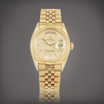 Day-Date, reference 1803 Montre bracelet en or jaune avec jour et date | Yellow gold wristwatch with day, date and bracelet Vers 1962 | Circa 1962