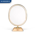 BRASS-FINISH OVAL BOUTIQUE MIRROR WITH MAPLE VENEERED BASE