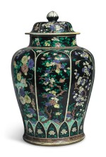 A LARGE FAMILLE-NOIRE 'BIRD AND FLOWER' BALUSTER JAR AND COVER, THE PORCELAIN 18TH CENTURY, THE ENAMELS LATER-ADDED