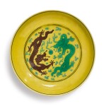 A YELLOW-GROUND AUBERGINE AND GREEN-ENAMELED ‘DRAGON’ DISH, DAOGUANG SEAL MARK AND PERIOD