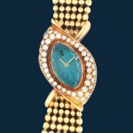 'Baroque' | An asymmetrical marquise-shaped yellow gold, diamond-set and blue crystal glass bracelet watch | Circa 1990