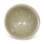 A small molded 'Yaozhou' celadon-glazed 'chrysanthemum' conical bowl, Northern Song / Jin dynasty
