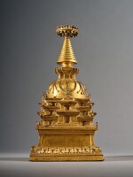 A large gilt-copper alloy stupa, Tibet, 15th century