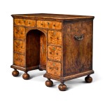 A Queen Anne walnut kneehole desk, early 18th century