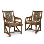 A pair of Gothic revival oak armchairs, third quarter 19th century, in the manner of Pugin