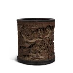 A finely carved 'scholars' bamboo brushpot, Qing dynasty, Kangxi period | 清康熙 竹雕松山文會圖筆筒