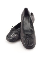 Pair of black leather and black patent leather ballet flats