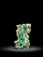 A carved jadeite 'phoenix and peony' vase, Qing dynasty, 19th century | 清十九世紀 翠玉浮雕鳳凰牡丹紋花插