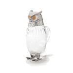 A Spanish glass decanter shaped as an owl with silver-plated mounts, 20th century | Carafe en verre taillé en forme de hibou, la monture en métal argenté, Espagne, XXème siècle